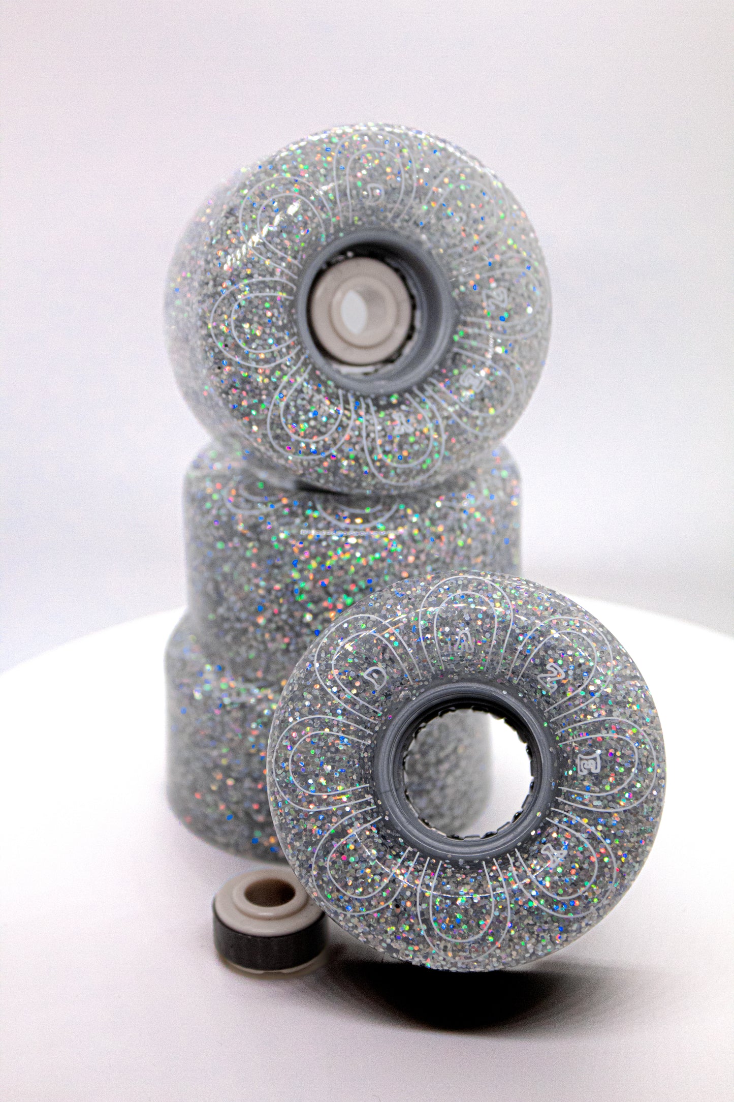 Light up roller skate wheels. Glitter roller skate wheels. Silver roller skate wheels.